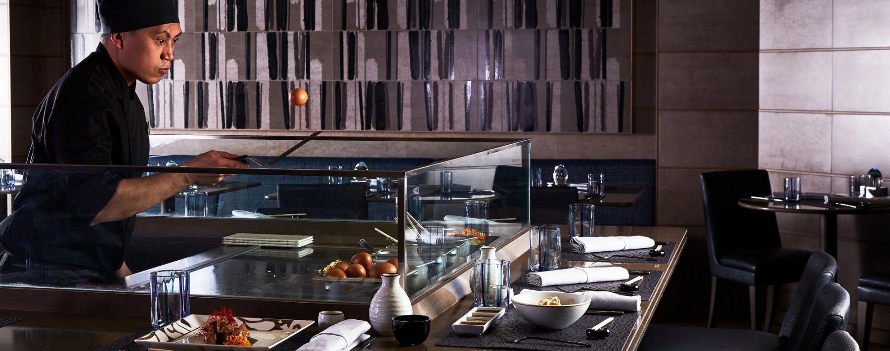 Chef preparing food at Kaiseki aboard Silver Muse
